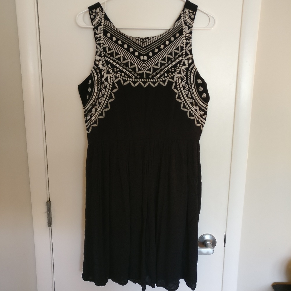Black dress with white knitted pattern